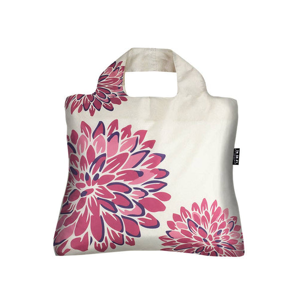off white bag with oversized pink and purple flowers on it. 