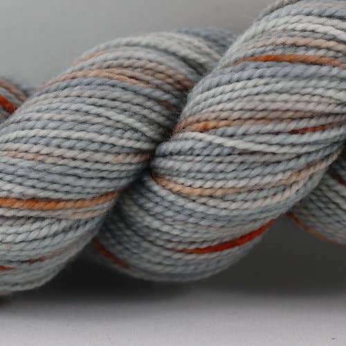 skein in grey, orange and brown