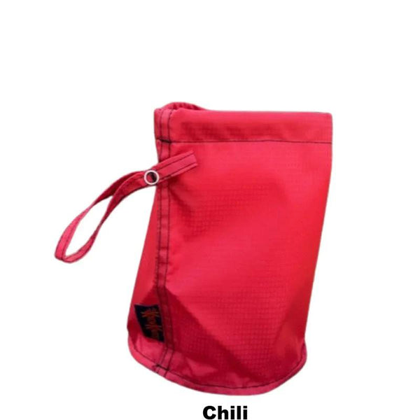 Red cloth bag with a strap on a white background
