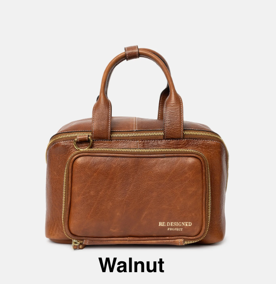 A leather knitting bag in the color Walnut