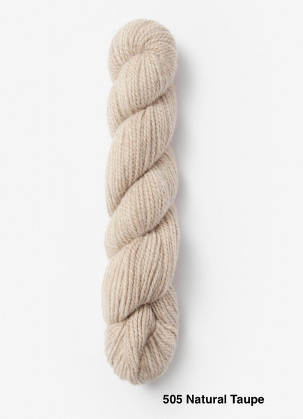 A skein of yarn in natural color labeled - 505 Natural Taupe on a white background
