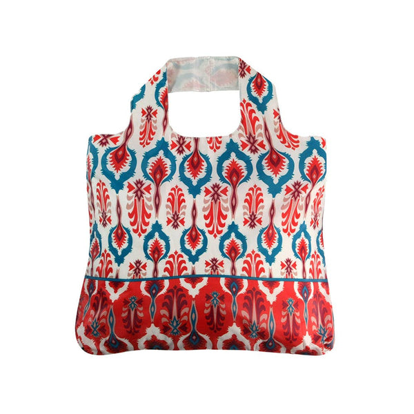 bag with colorful design in blue, coral, red and dark red