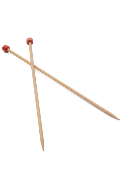 Pair of wooden knitting needles with red ends on a white background