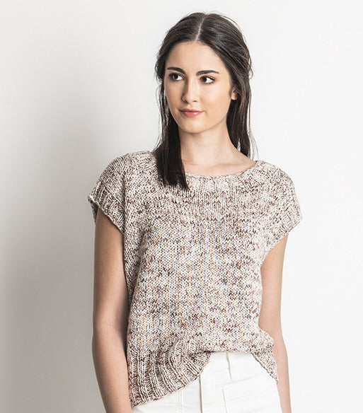Woman in short sleeved cotton top 